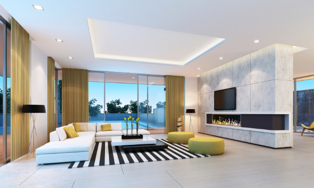 Photo présentant l'intérieur d'une belle maison contemporaine donnant sur une piscine.